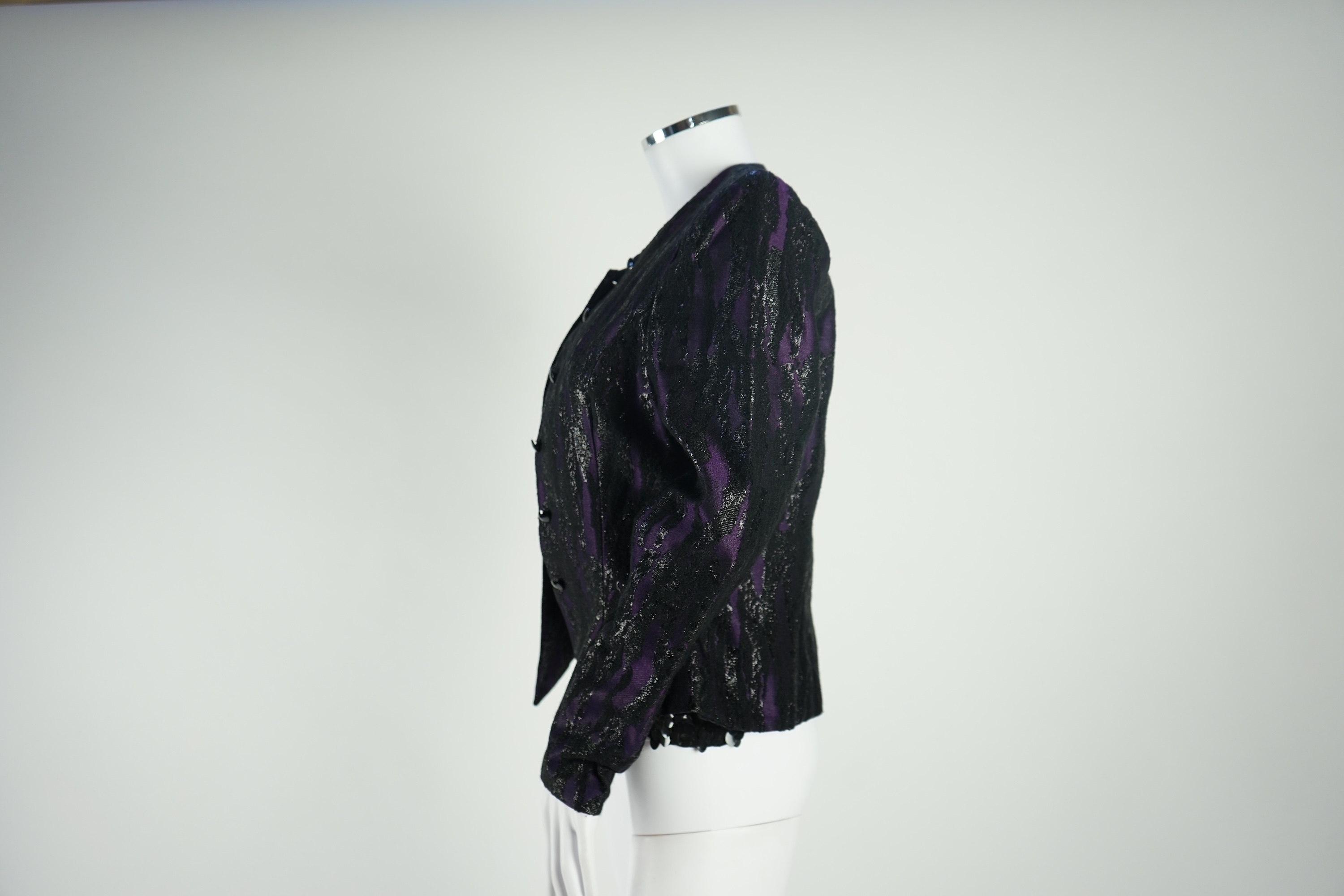 A lady's Boss (Hugo Boss) metallic purple and black evening jacket, three black skirts (Alexander McQueen, Emporio Armarni and Versace Classic) and a black sequin Ben de Lisi vest top, all approx. size 10